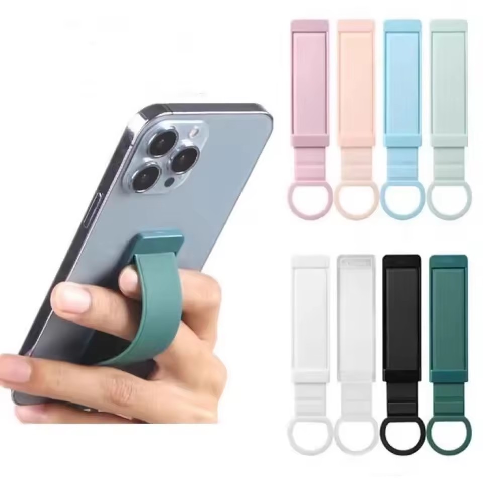 Phone Accessories Vendor - ユニバーサルリストバンドフィンガーホルダー目に見えないバックル携帯電話バックステッカーデスクブラケット伸縮式プッシュプルハンドルグリップスタンド